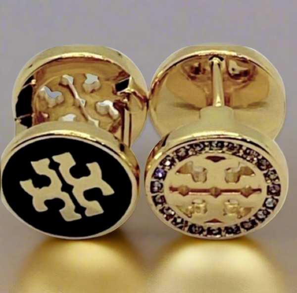Auténticos pendientes reversibles de cristal Tory Burch de doble cara en negro y oro