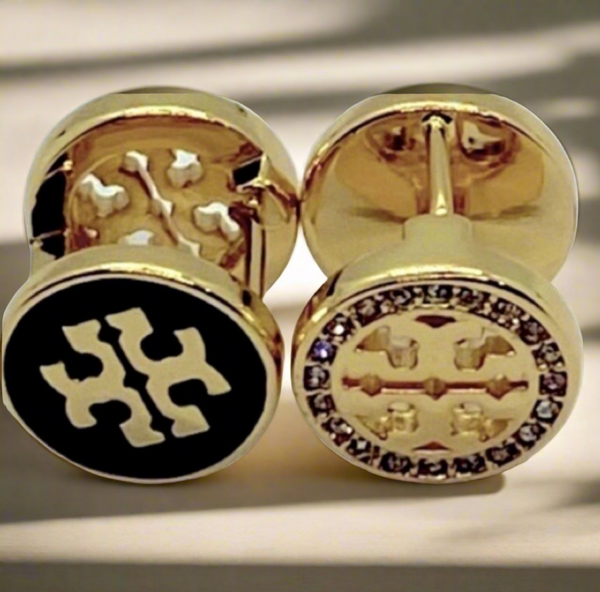 Auténticos pendientes reversibles de cristal Tory Burch de doble cara en negro y oro