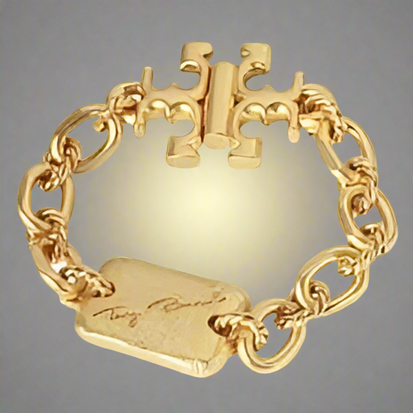Tory Burch Bracelet Torsade Engraved Logo In Vintage Gold Brass