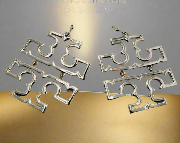 Pendientes colgantes de plata brillante auténticos de Tory Burch Britten