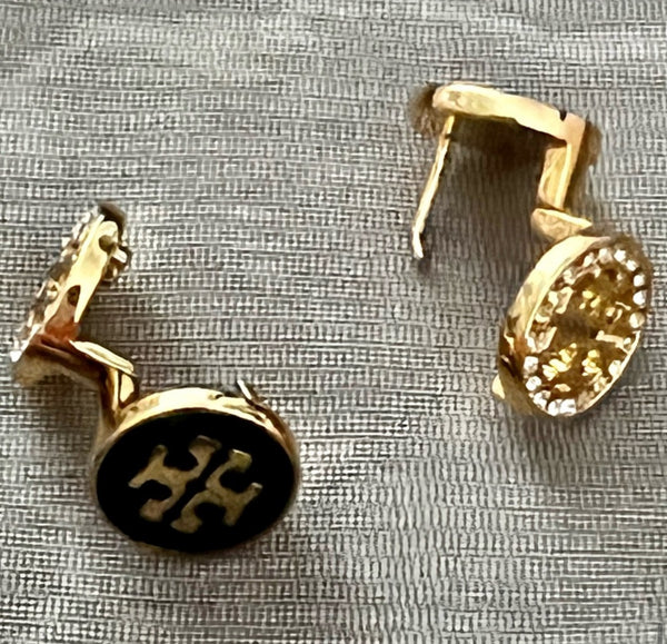Auténticos pendientes reversibles de cristal Tory Burch de doble cara en negro y oro