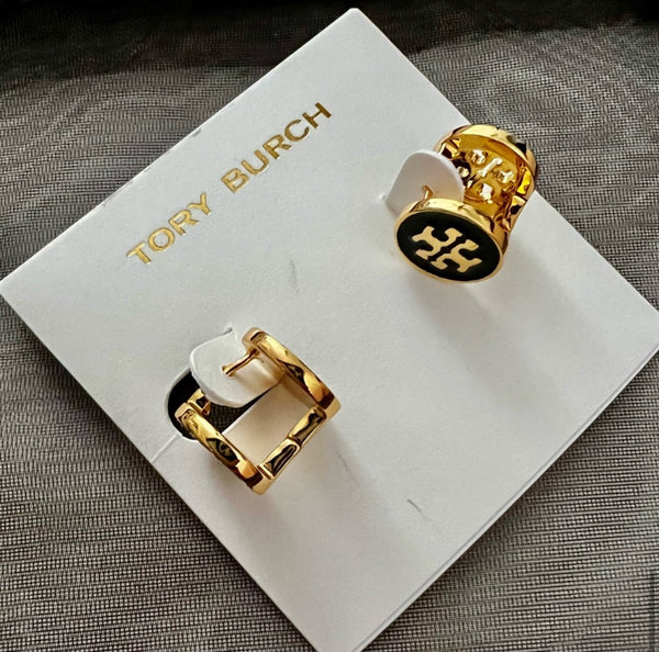 Auténticos pendientes reversibles de cristal Tory Burch de doble cara en negro y oro