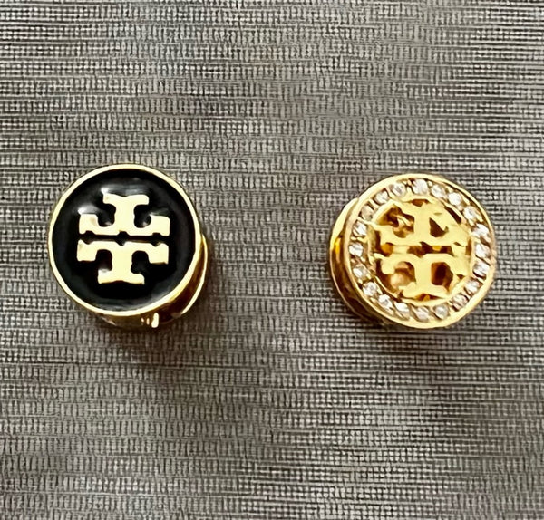 Auténticos pendientes reversibles de cristal Tory Burch de doble cara en negro y oro