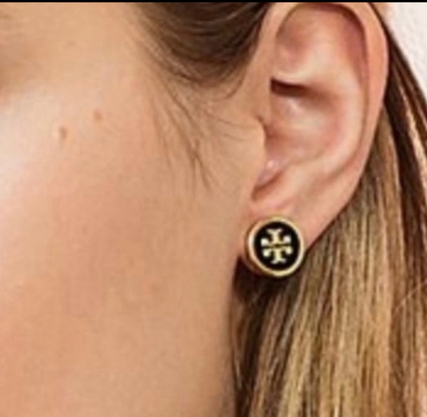 Auténticos pendientes reversibles de cristal Tory Burch de doble cara en negro y oro