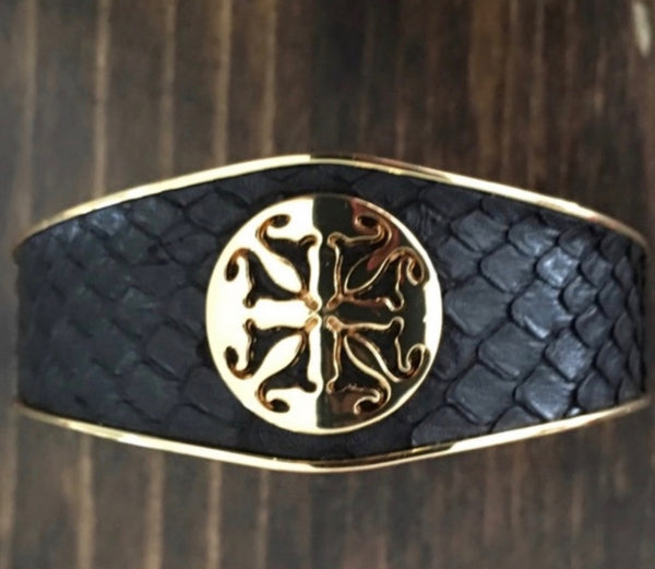 Rustic Cuff Bracelet with Black Faux Snake Pattern With Gold Emblem And Trim