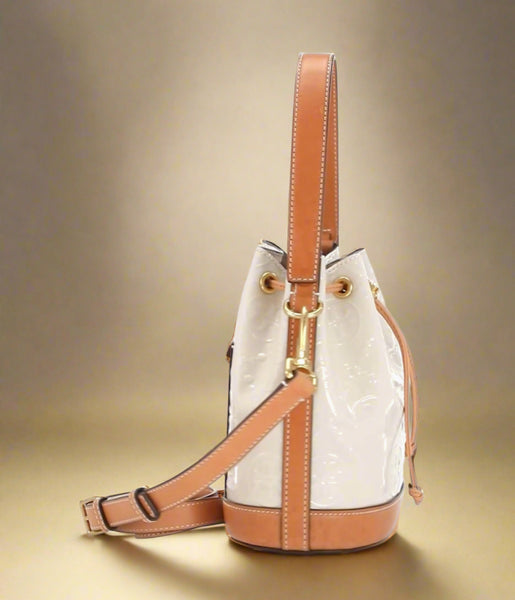 Tory Burch T Monogram Embossed Patent Leather Cream And Tan Bucket Bag