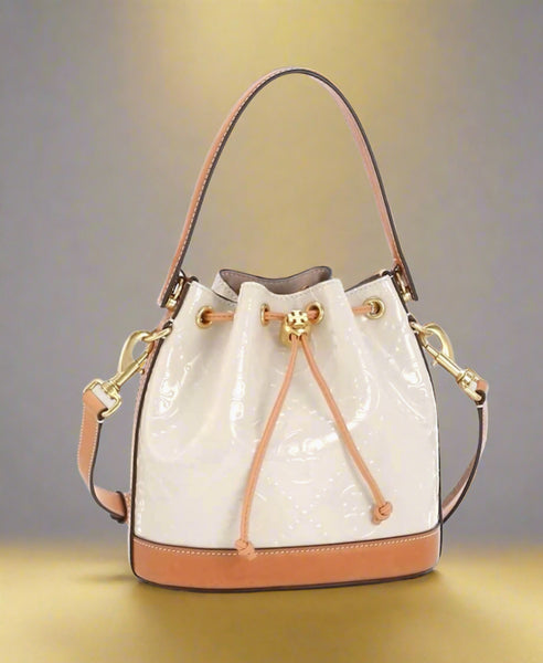 Tory Burch T Monogram Embossed Patent Leather Cream And Tan Bucket Bag