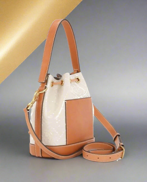 Tory Burch T Monogram Embossed Patent Leather Cream And Tan Bucket Bag