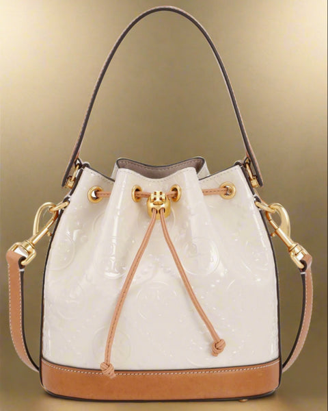 Tory Burch T Monogram Embossed Patent Leather Cream And Tan Bucket Bag